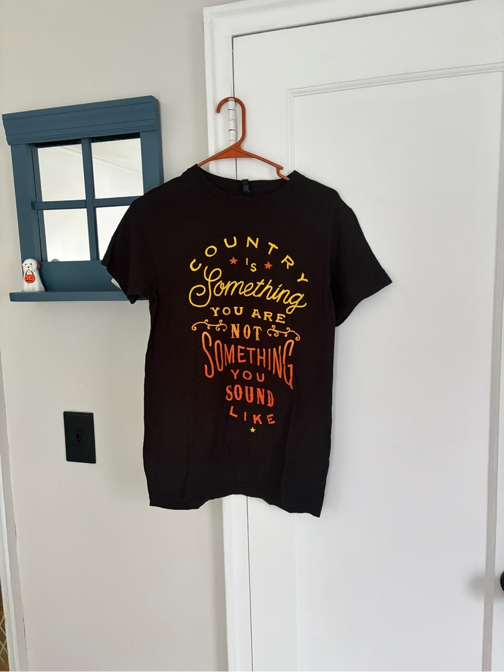 Tultex Black David Nail Graphic Tee with Yellow-Orange Script